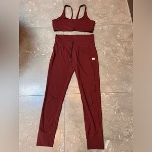 Vuori daily leggings and sports bra set.  Deep purple/burgundy color.